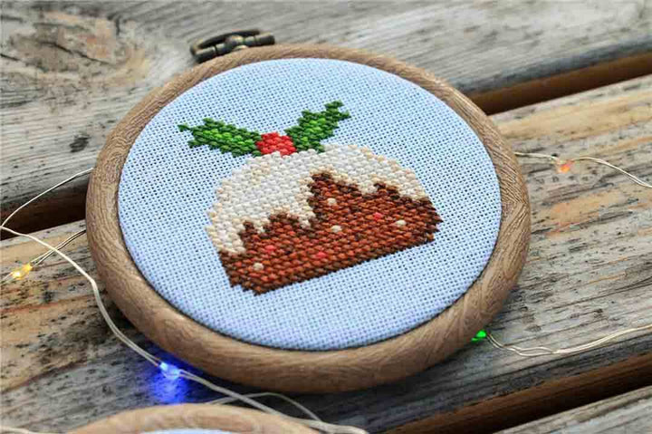 An image of a stitched preview of the counted cross stitch pattern Cacao Mug And Pudding by Kate Spiridonova