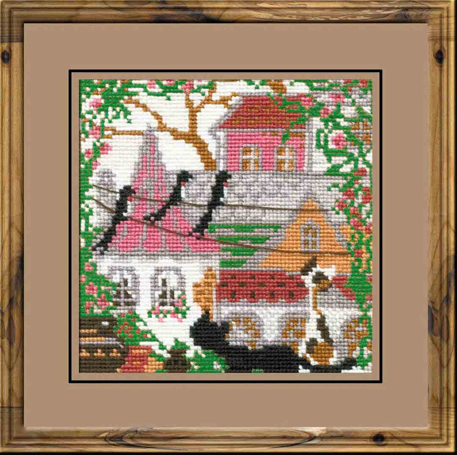 A stitched preview of City And Cats Summer Counted Cross Stitch Kit