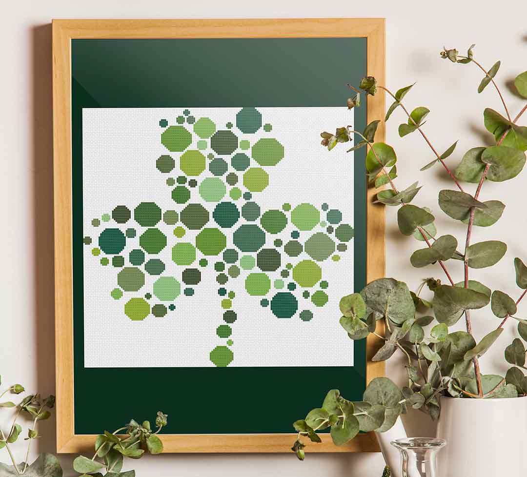 A stitched preview of the counted cross stitch pattern and kit "Clovers" by Stitch Wit