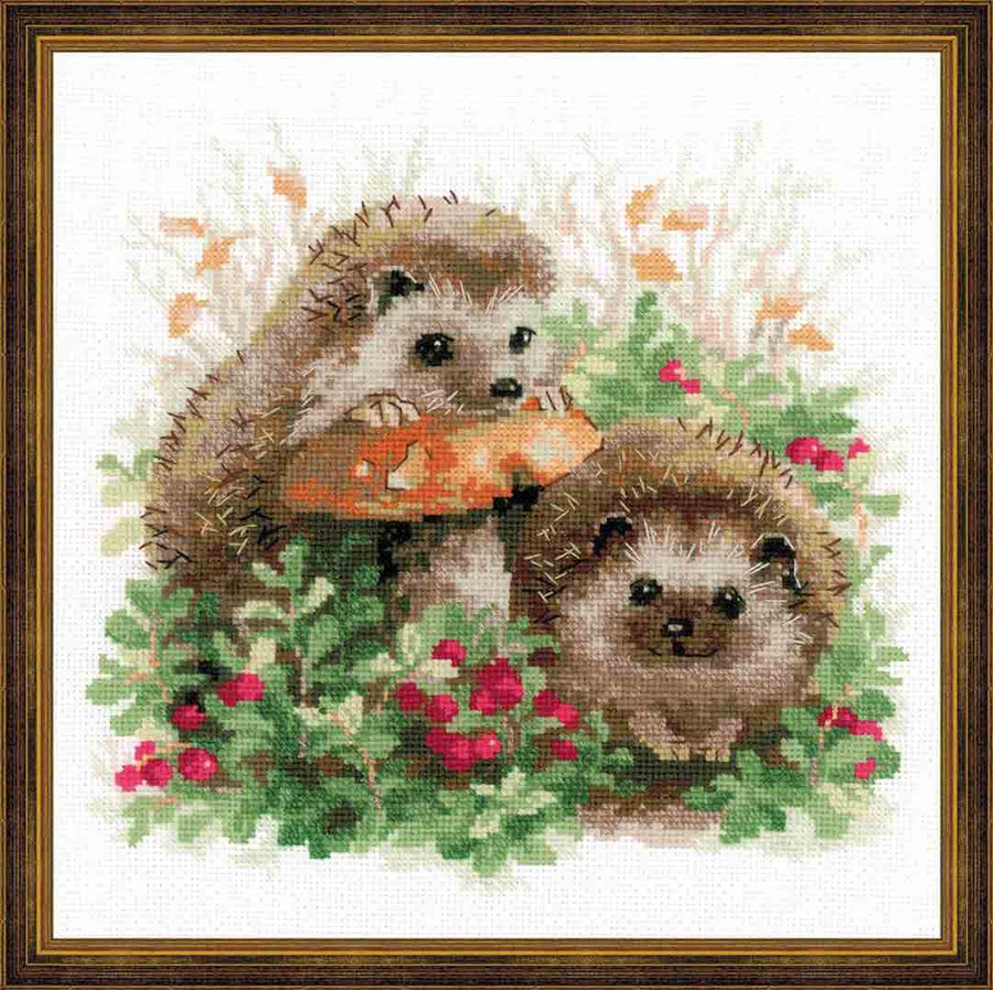 A stitched preview of Hedgehogs In Lingonberries Counted Cross Stitch Kit