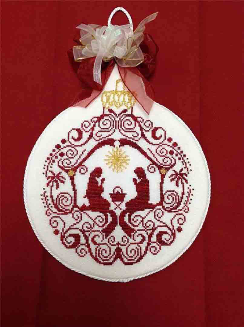 Image of stitched counted cross stitch pattern Manger Ornament by Alessandra Adelaide Needleworks