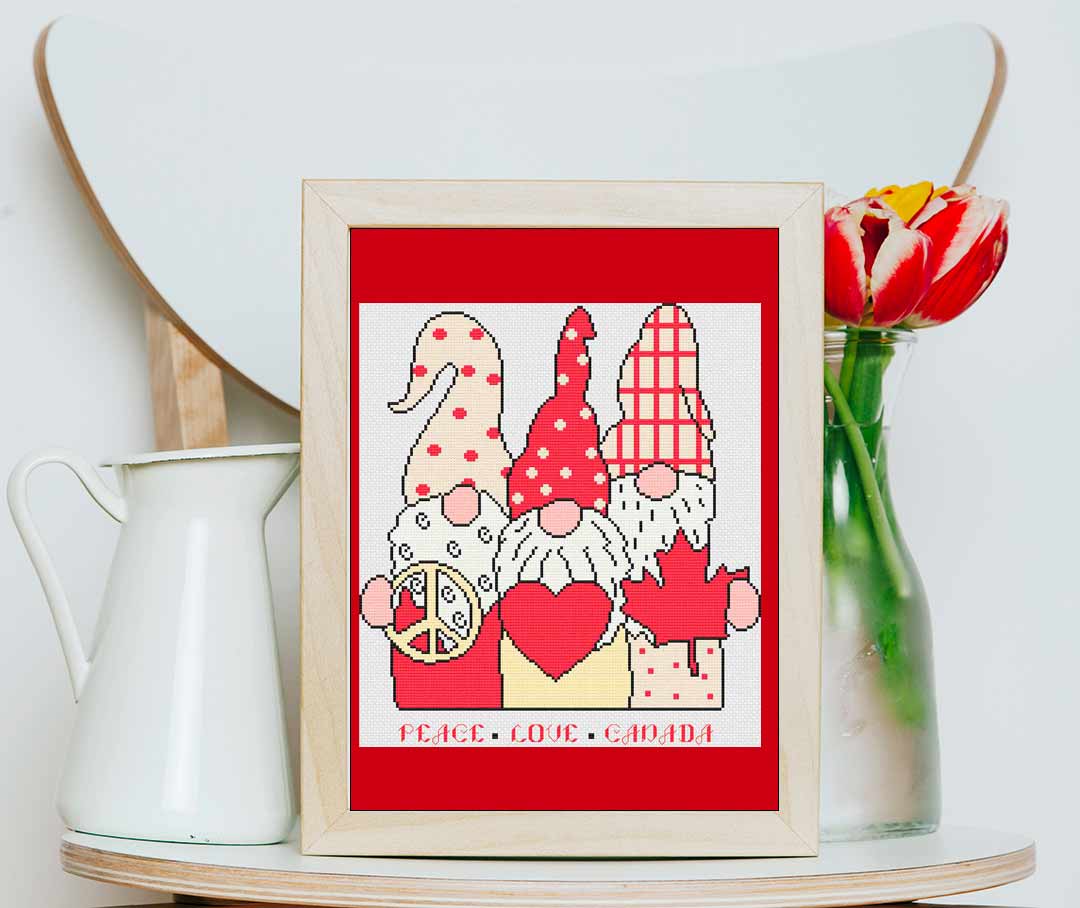 A stitched preview of the counted cross stitch pattern and kit Peace Love Canada by Stitch Wit