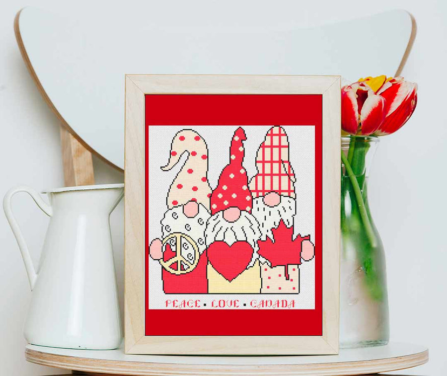 A stitched preview of the counted cross stitch pattern and kit Peace Love Canada by Stitch Wit