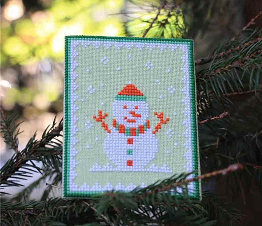 A stitched preview of the counted cross pattern Snowman by Kate Spiridonova