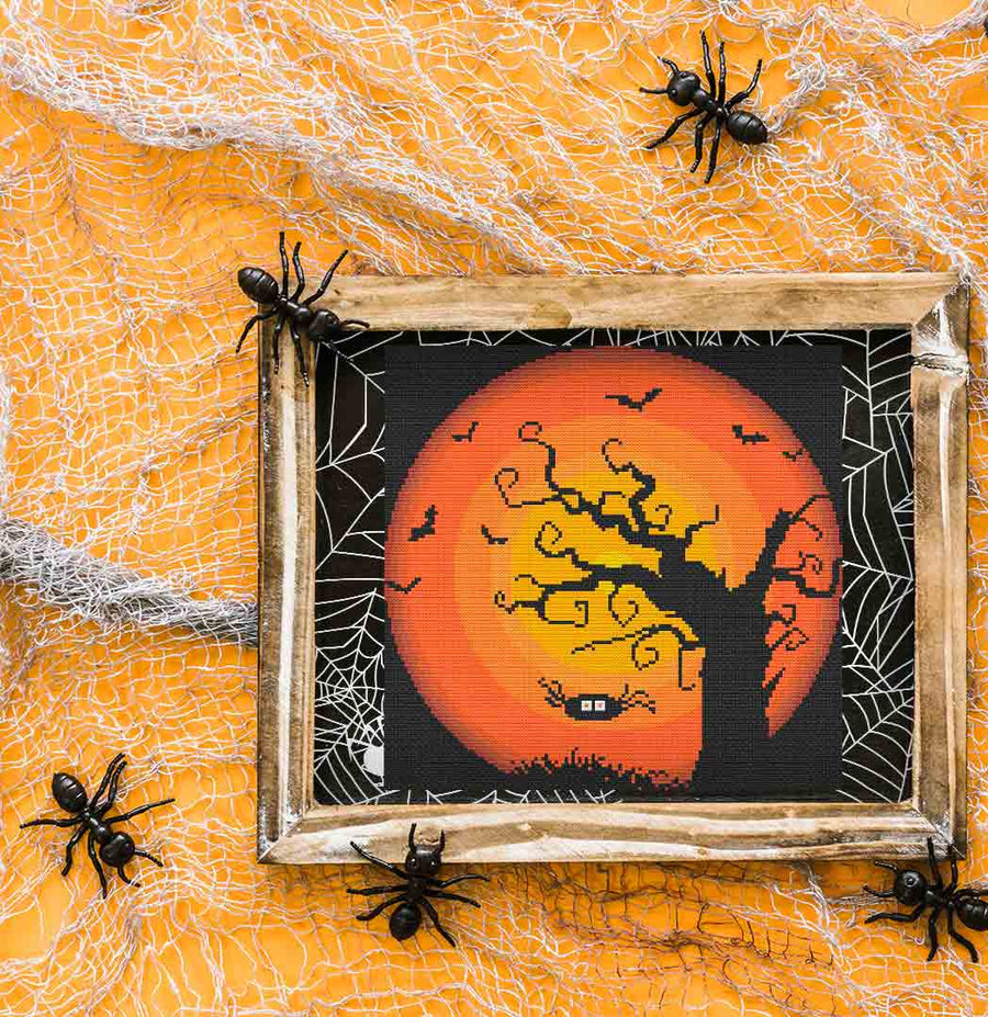 Image of stitched and framed preview of "Spider And A Tree" Counted Cross Stitch Pattern and Kit by Stitch Wit