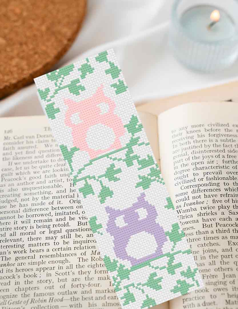 A stitched preview of the free counted cross stitch pattern "Two Spring Owls Bookmark"