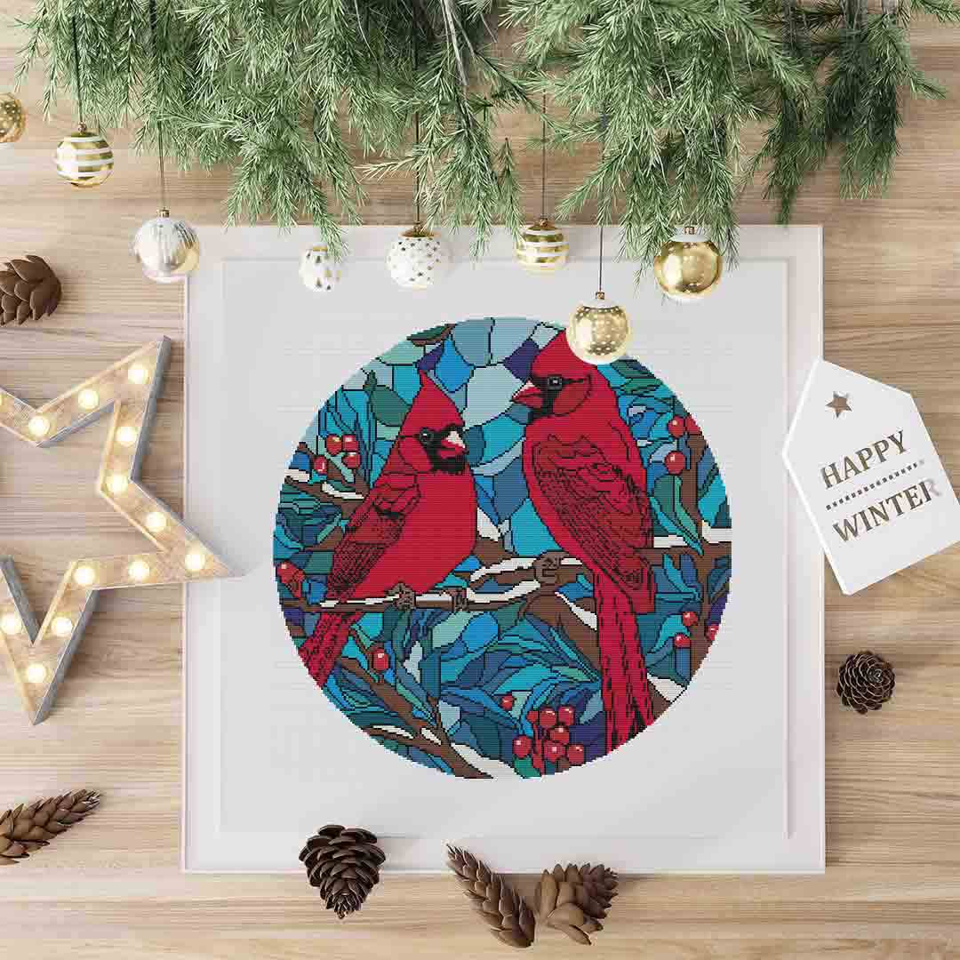 A stitched preview of Stained Glass Cardinals: Counted Cross Stitch Pattern and Kit