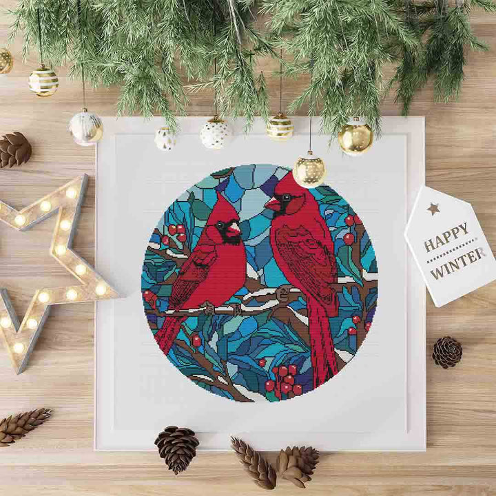 A stitched preview of Stained Glass Cardinals: Counted Cross Stitch Pattern and Kit