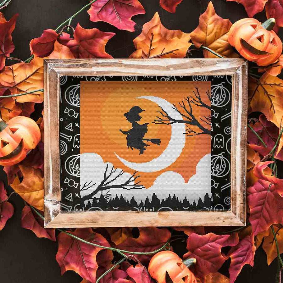 Image of stitched and framed preview of "Witch A Ride" Counted Cross Stitch Pattern and Kit by Stitch Wit