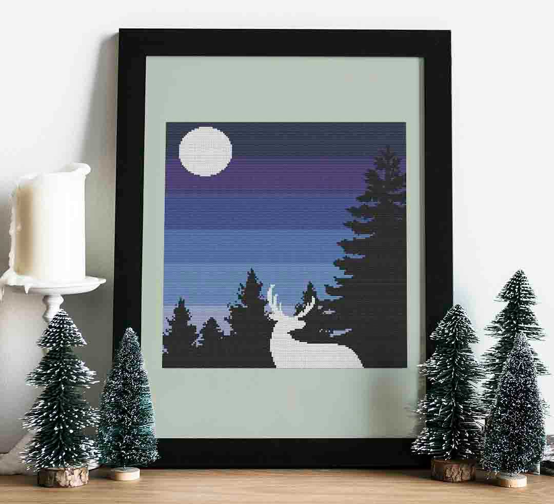 Stitched and framed preview of Blue Winter Night Counted Cross Stitch Pattern and Kit