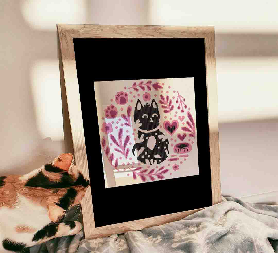 Stitched and framed preview of Soft Kitty Warm Kitty Counted Cross Stitch Pattern and Kit
