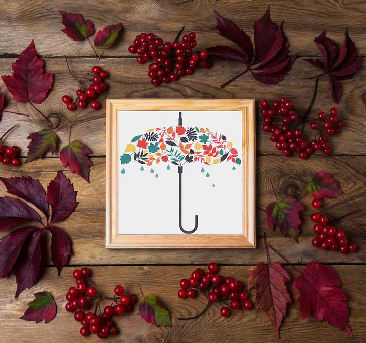 Stitched and framed preview of Autumn Umbrella Counted Cross Stitch Pattern and Kit