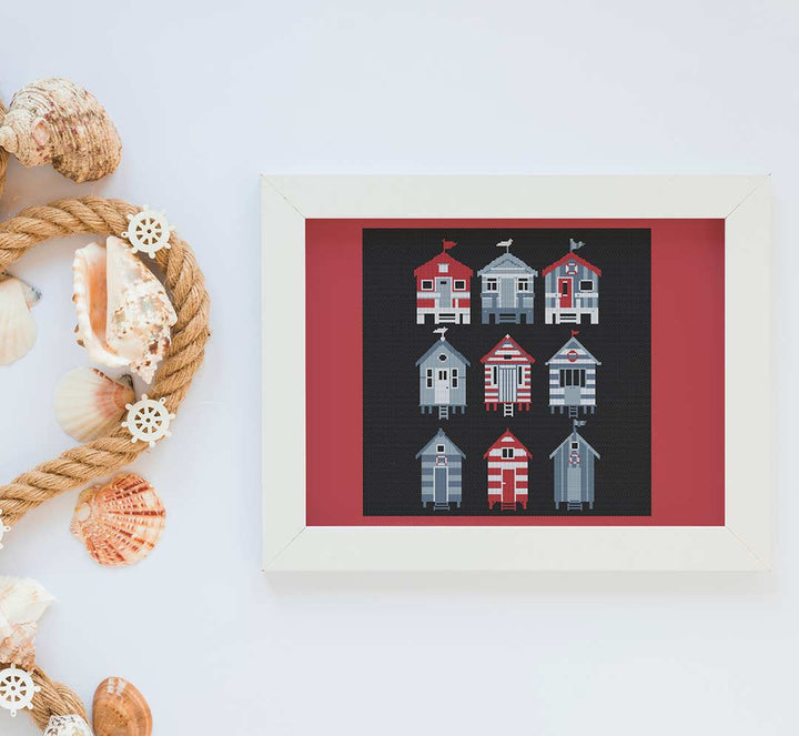 Stitched and framed preview of Beach Houses Counted Cross Stitch Pattern and Kit