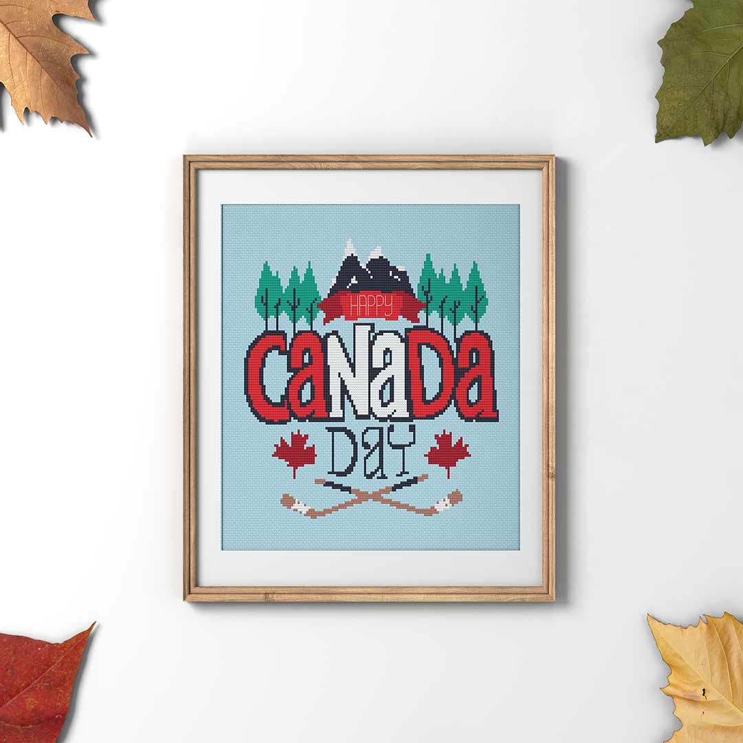 Stitched and framed preview of Canada Day cross stitch pattern