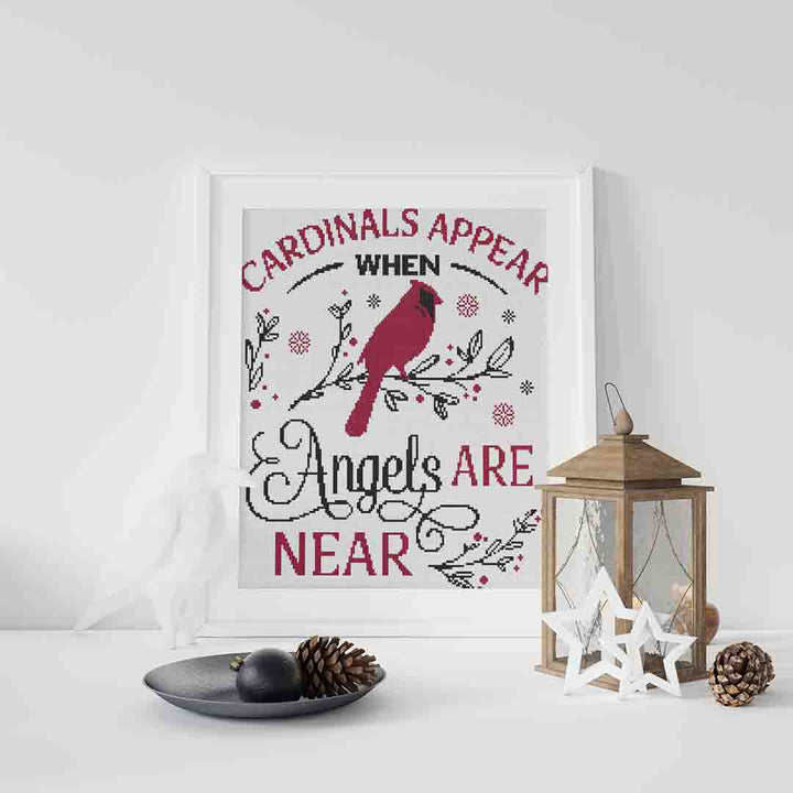 Stitched and framed preview of Cardinals Appear Counted Cross Stitch Pattern and Kit
