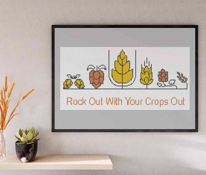 Stitched and framed preview of Crops Out Counted Cross Stitch Pattern and Kit