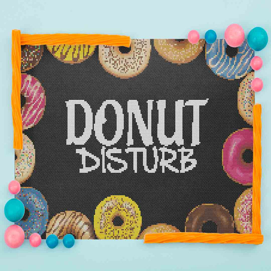 Stitched and framed preview of Donut Disturb Counted Cross Stitch Pattern and Kit