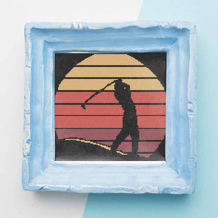 Stitched and framed preview of Golf Silhouette Counted Cross Stitch Pattern and Kit