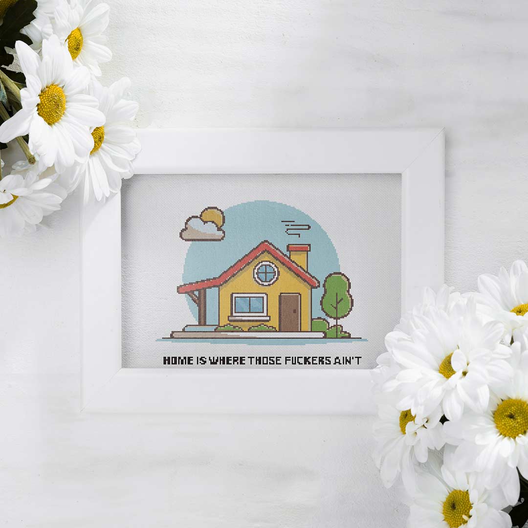 Stitched and framed preview of Home Is Counted Cross Stitch Pattern and Kit