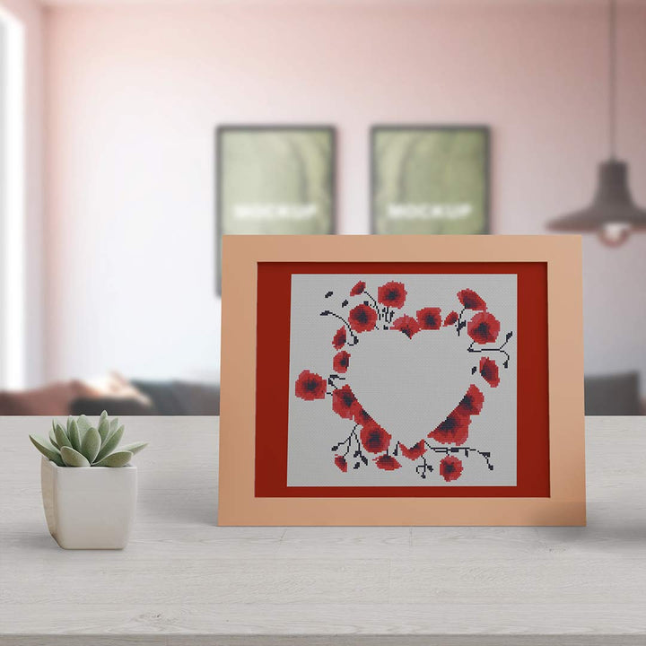 Stitched and framed preview of Poppy Love Counted Cross Stitch Pattern and Kit