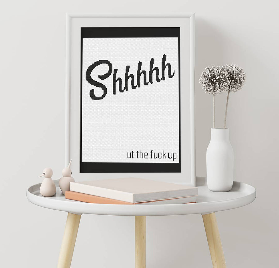 Stitched and framed preview of Shhh Counted Cross Stitch Pattern and Kit
