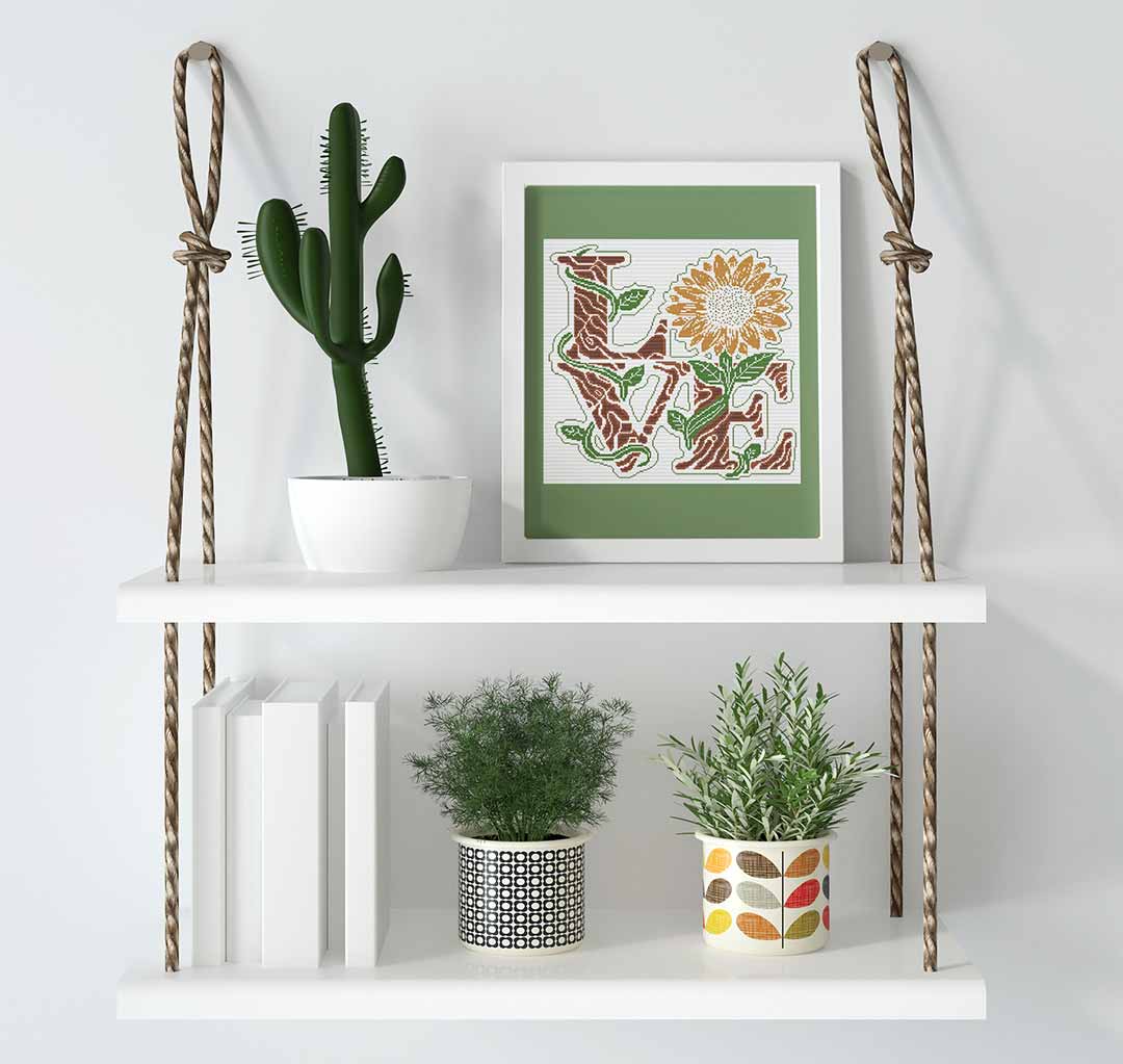 Stitched and framed preview of Sunflower Love Counted Cross Stitch Pattern and Kit