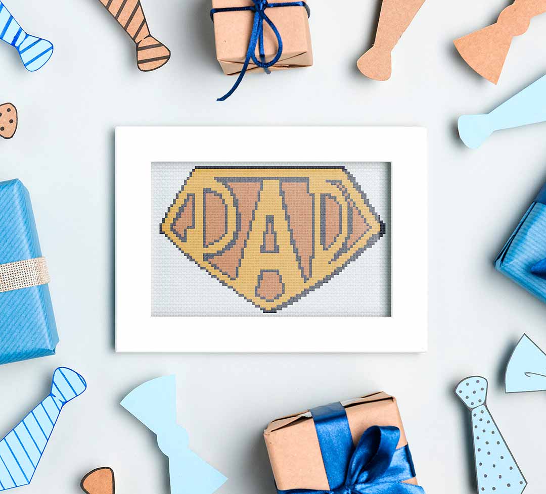Stitched and framed preview of Super Dad Counted Cross Stitch Pattern and Kit