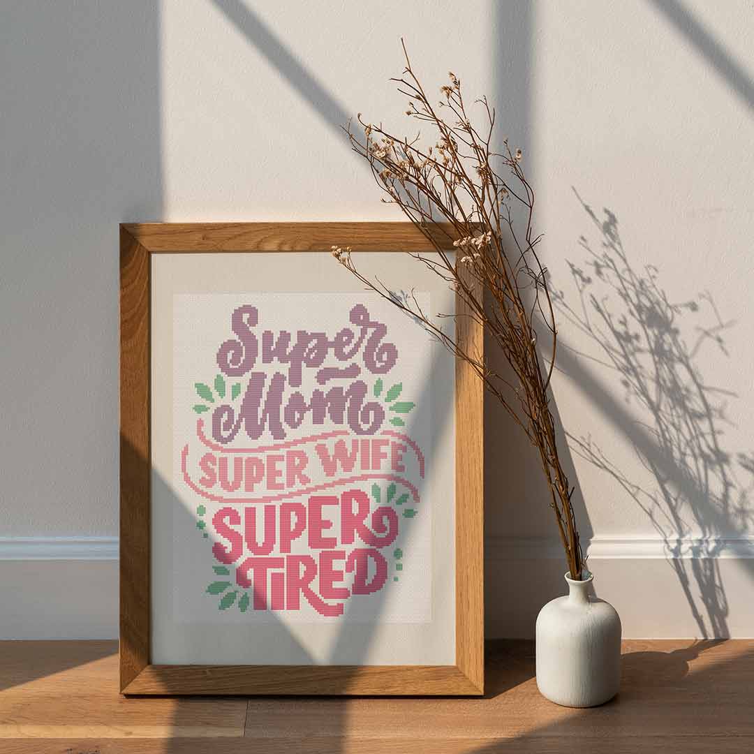Stitched and framed preview of Super Wife Counted Cross Stitch Pattern and Kit